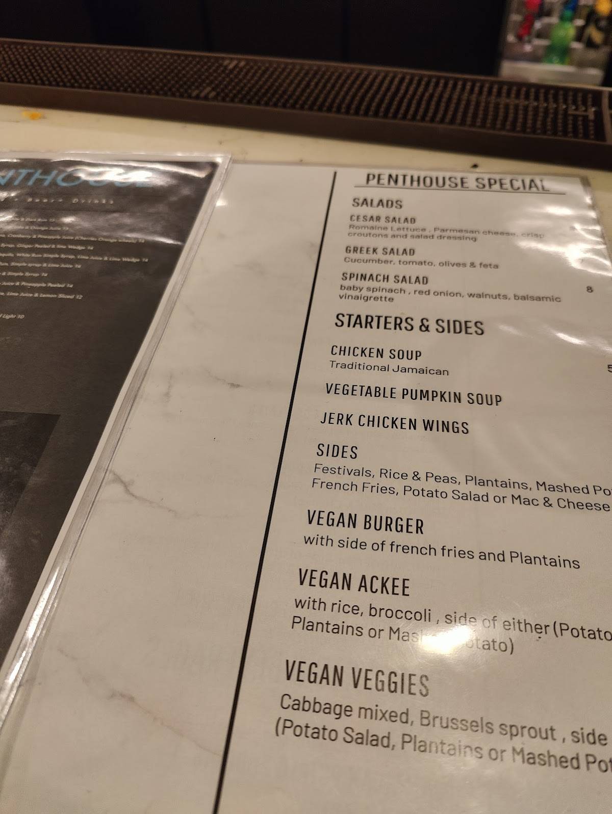 Image showcasing Menu at Penthouse Caribbean Restaurant Cafe & Bar, Denver