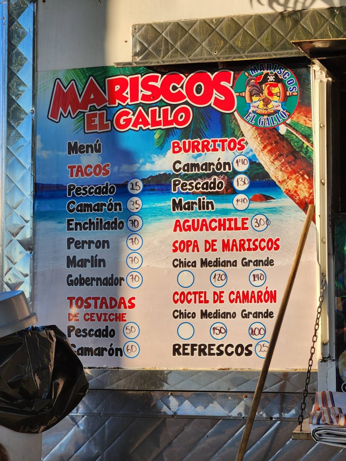 Menu at Mariscos El Gallo food truck restaurant, Tijuana