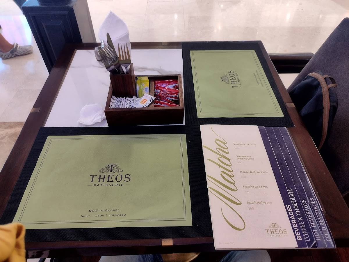 THEOS SECTOR 18 NOIDA menu