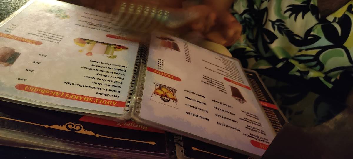 Queen's hub Night Club Rooftop Restaurant menu