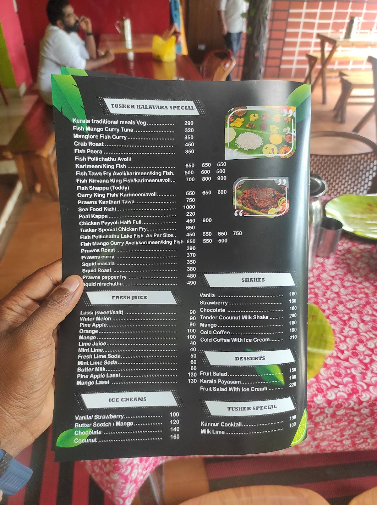 TUSKER CAF'E Restaurant Thekkady menu